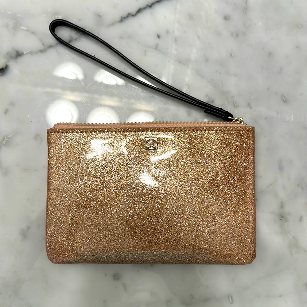 Kate Spade pink/ goldish sparkling wristlet